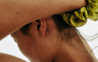 Close up of female scalp and neck